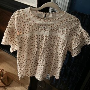 Hi, my name is Shari, I am selling a Loft blouse size XS NWT.